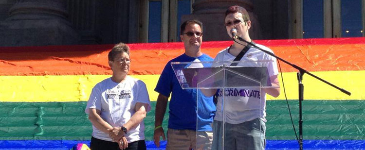 LeRoy Fiscus (right) praying at the Boise Pride Rally