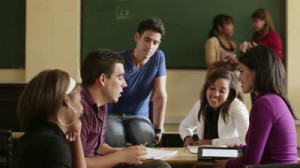 stock-footage-young-people-at-school-group-of-college-students-talking-in-university-classroom