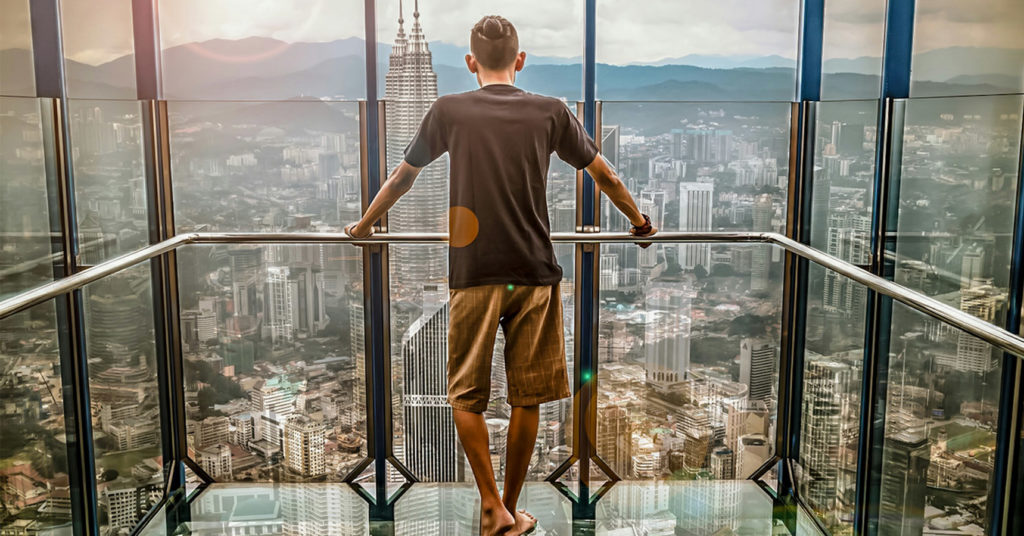 Man Looking Over City 1719x900
